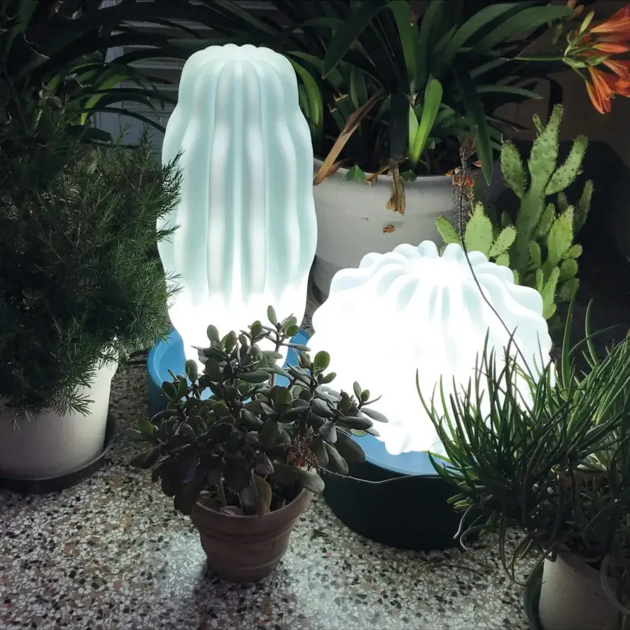 Exclusive Serralunga Cactus sculpture with organic forms crafted in pale turquoise-green and bright white LLDPE with smooth finish