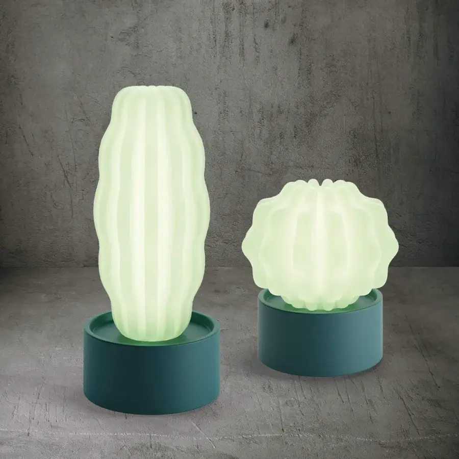 Captivating Serralunga Cactus sculpture with translucent pale green body built in durable LLDPE and satin teal base