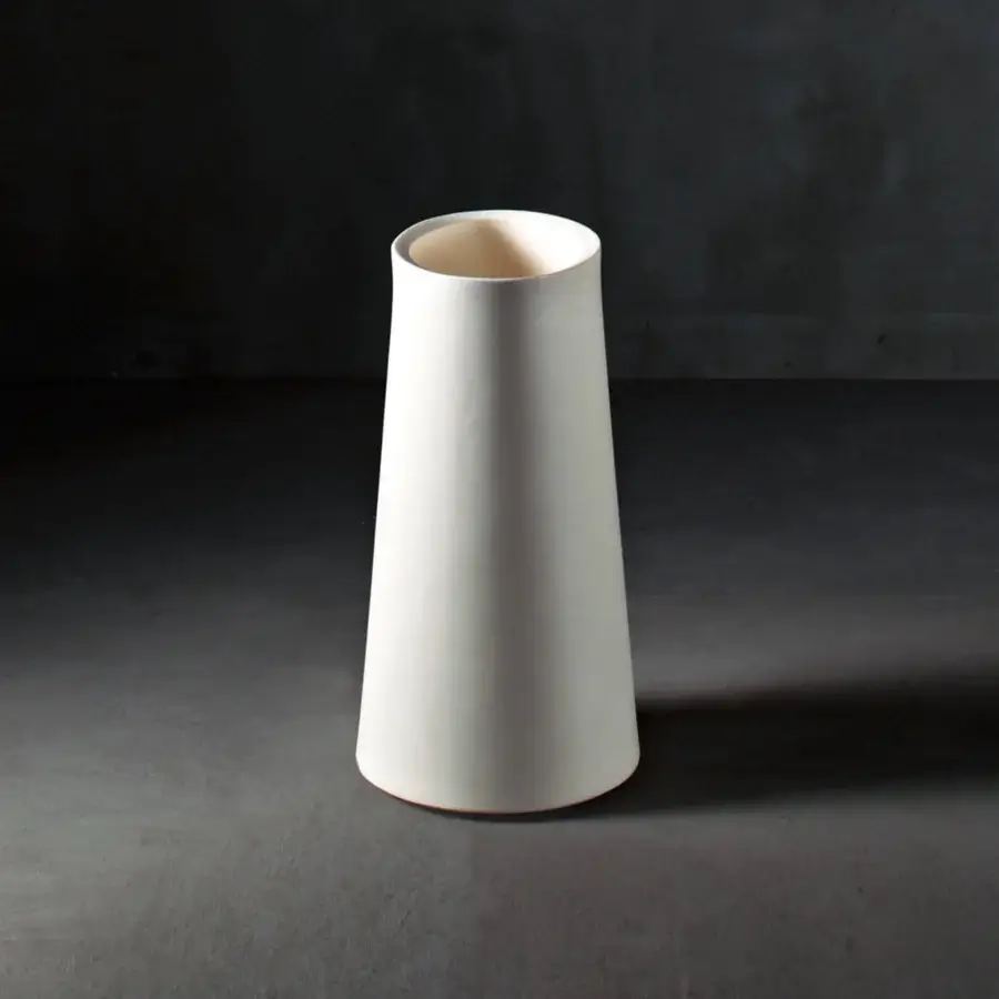 Exceptional Serralunga Giano umbrella stand with conical form in light beige recyclable LLDPE and matte finish