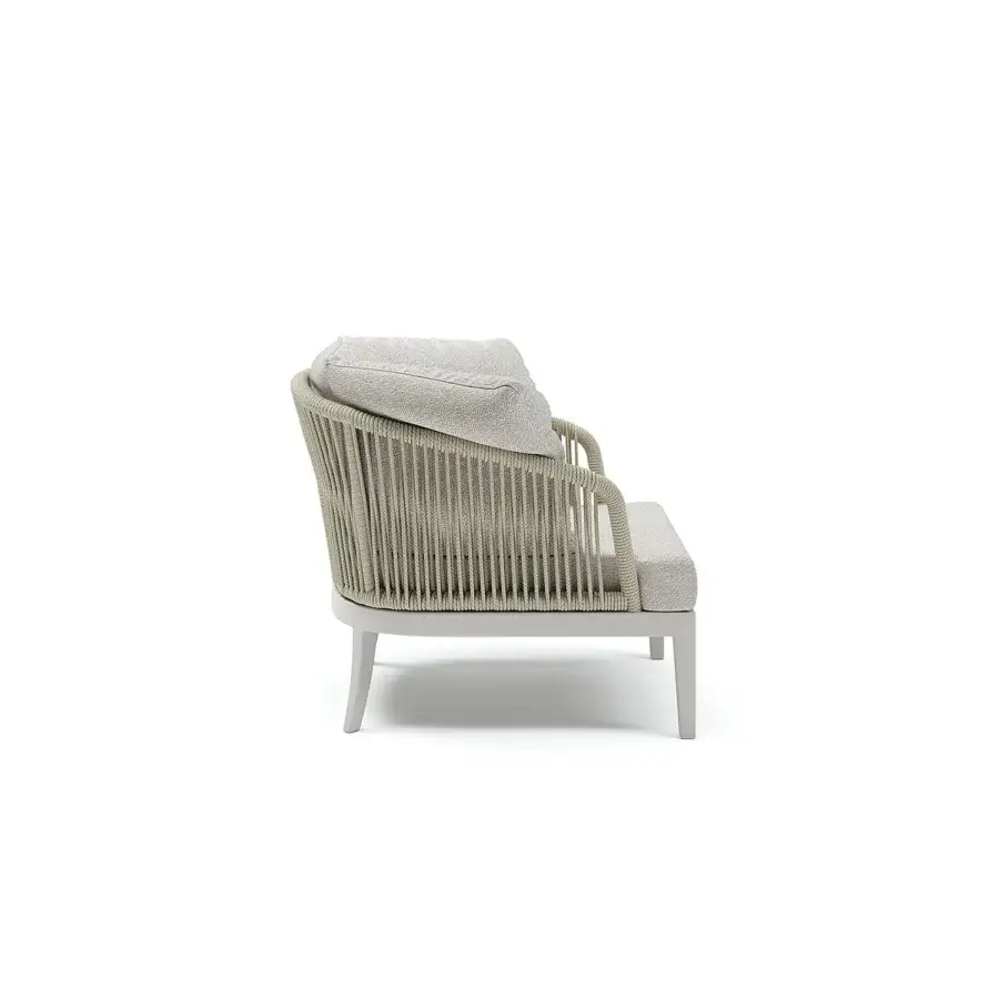 Distinguished Atmosphera Dream 2.0 lounge chair with elegantly curved silhouette and hand-woven light-grey rope detailing crafted in light-colored metal