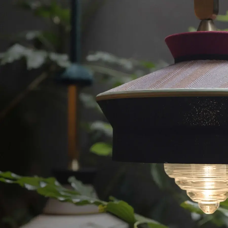 Exceptional Contardi Calypso Outdoor suspension lamp with waterproof fabrics, a sealed glass cylinder, dark charcoal body and satin beige shade