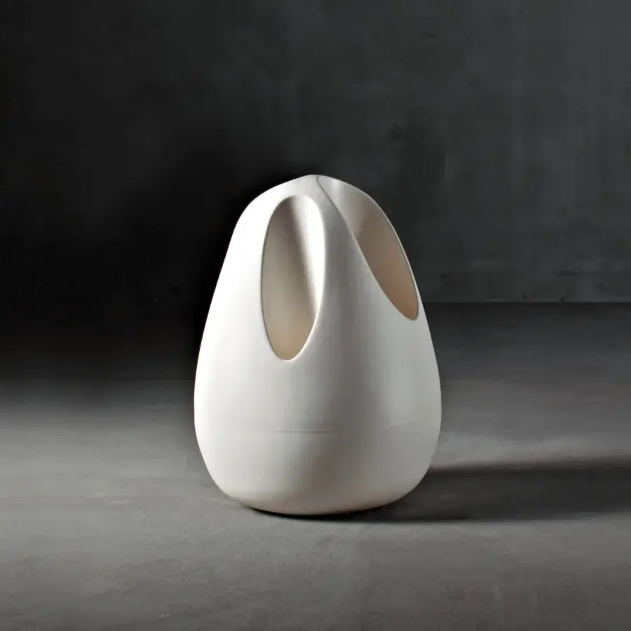 Elegant Serralunga Plomb umbrella stand with ovoid form crafted in off-white recyclable LLDPE plastic and matte finish
