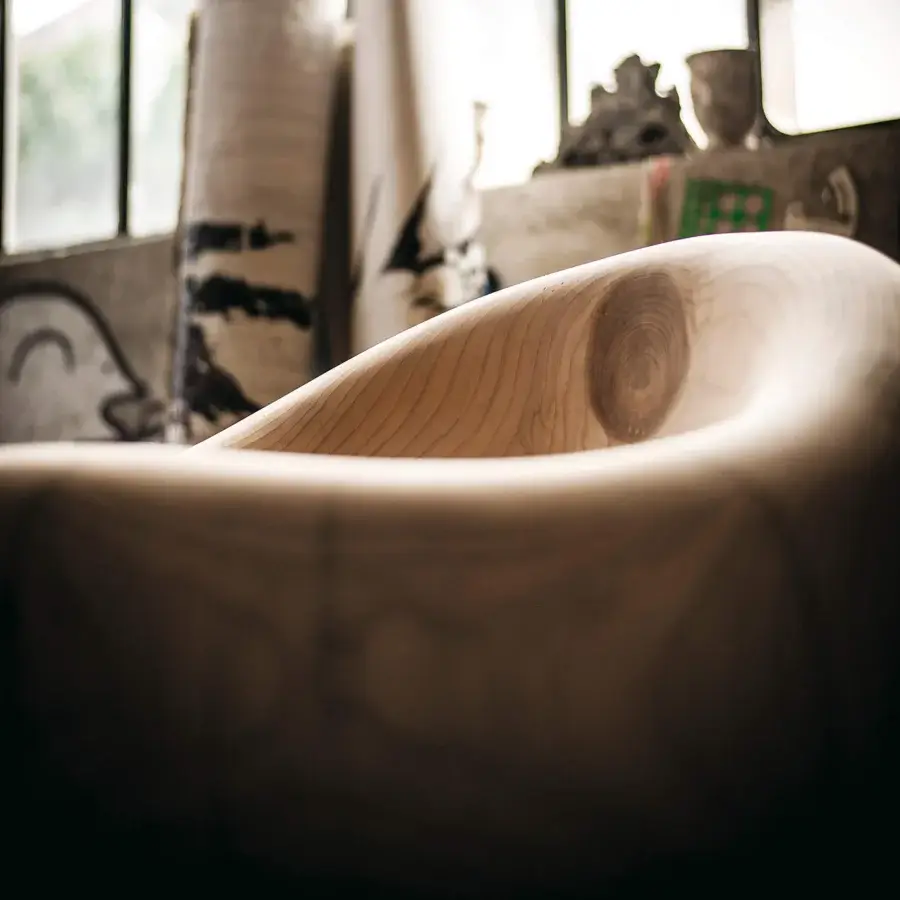 Exceptional Riva 1920 Maui lounge chair carved from Lebanon cedar with a smooth satin finish and light brown hue