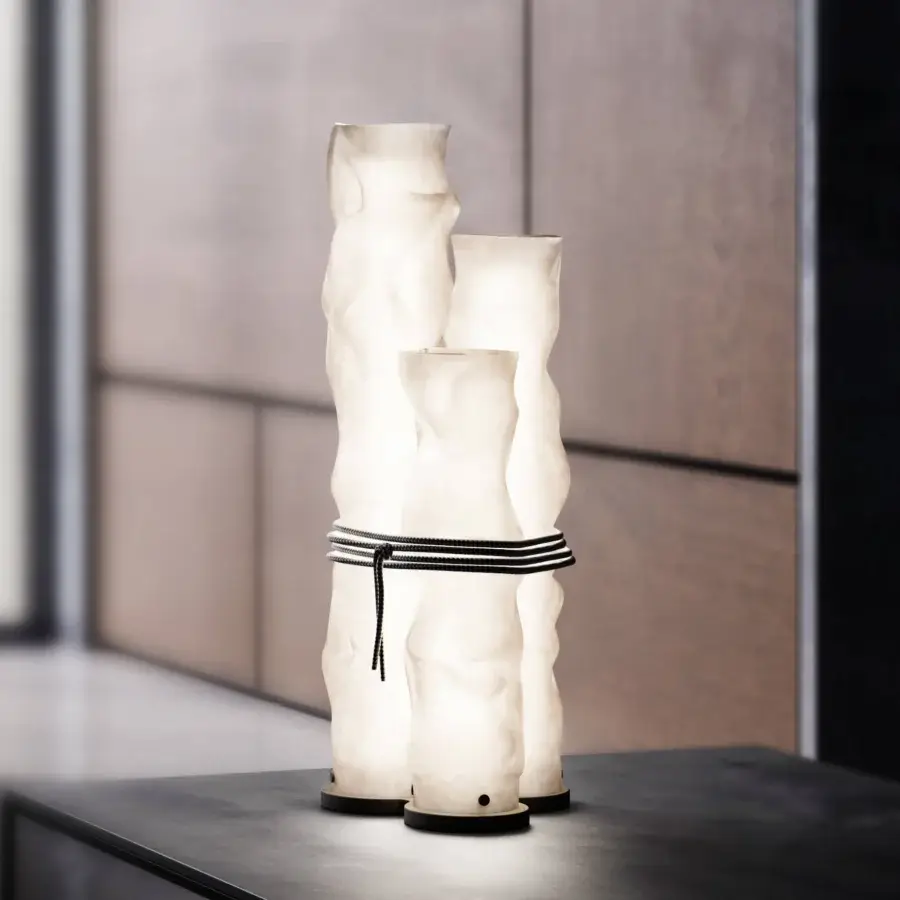 Exceptional Contardi Baggy Trio table lamp crafted in double-satin polycarbonate with a dark gray textile cord exhibiting organic tiers