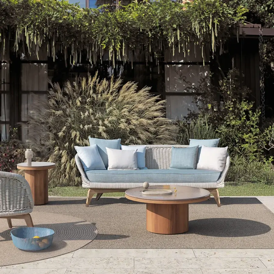 Superior Atmosphera Frisbee coffee table crafted with teak structure and satin-finish wood tabletop in a warm medium-brown tone