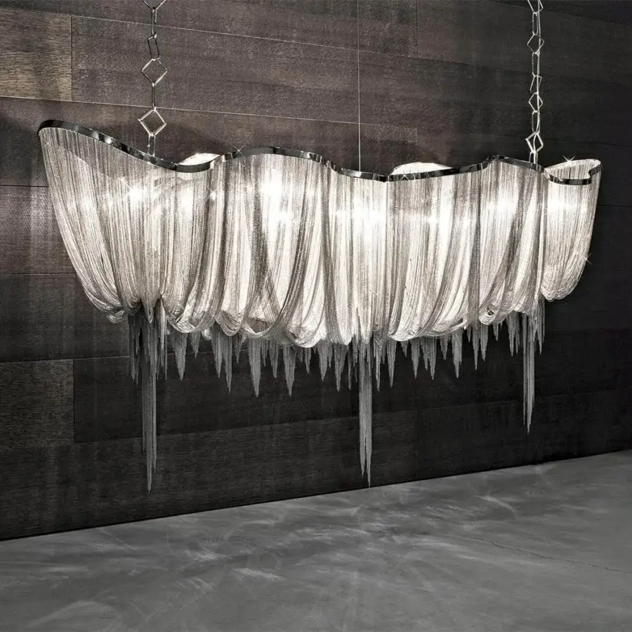 Distinguished Terzani Atlantis suspension lamp crafted with nearly three miles of hand-draped brass chains in a shimmering silver finish