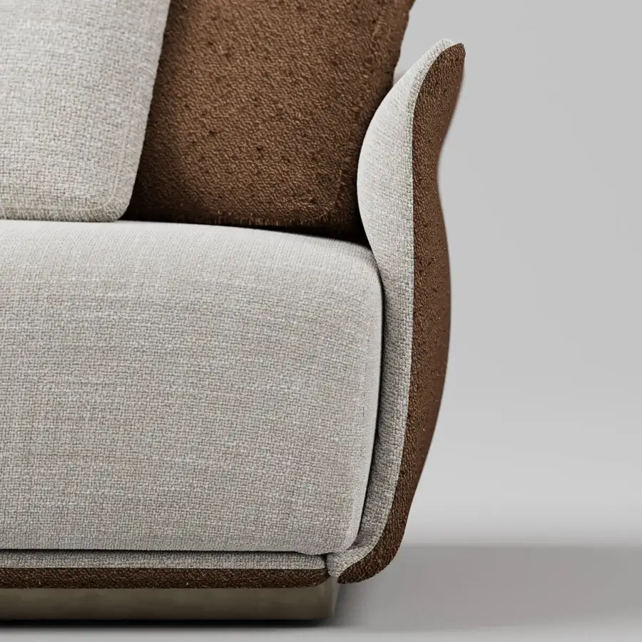 Distinguished Capital Mon Allure lounge chair with gracefully curved shell and light neutral beige fabric upholstery with warm brown quilted detailing