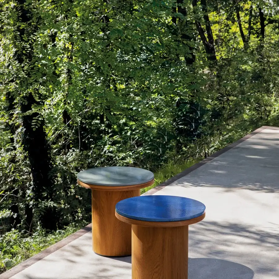 Sophisticated Atmosphera Frisbee side table with vibrant blue Gres tabletop and robust teak base