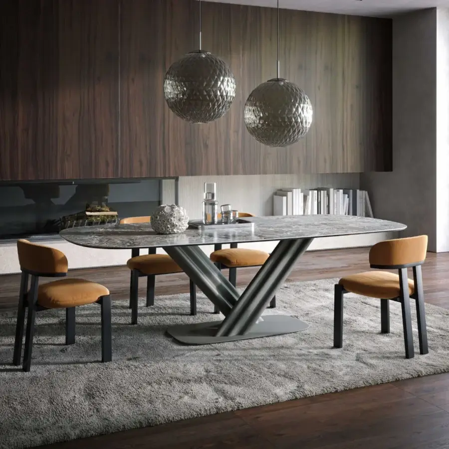 Distinguished Tonin Casa Sipario table with a sculpted dark metal base and polished grey veined ceramic tabletop