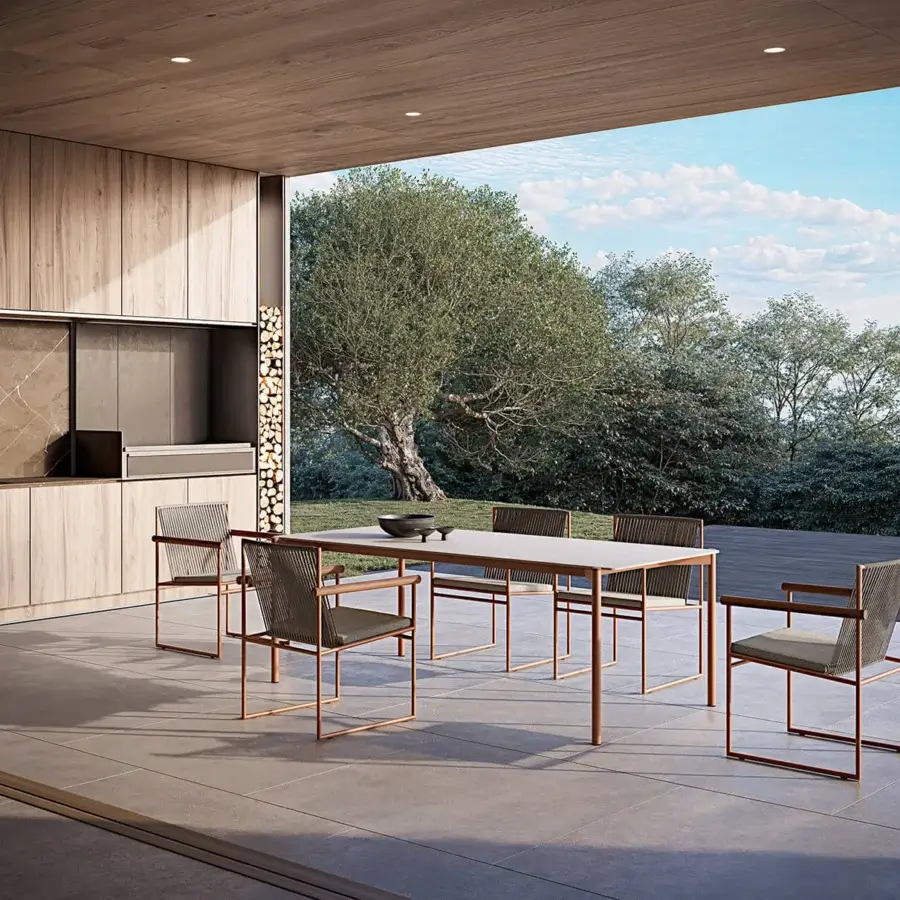 Superior Atmosphera Heritage table crafted with gres, teak and satin aluminum, displaying golden accents