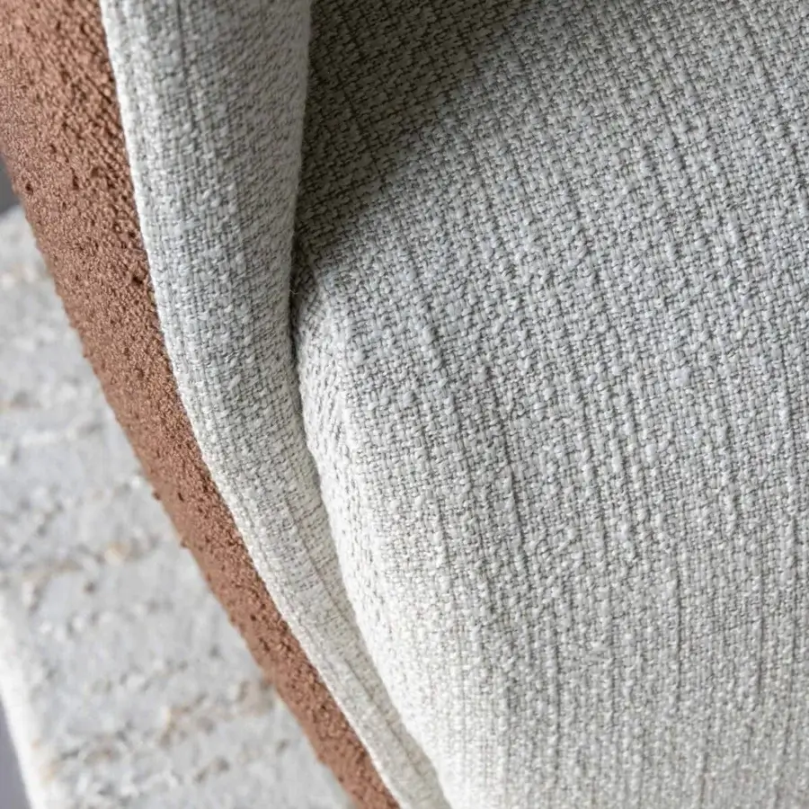 Superior Capital Mon Allure sofa built with textured beige and brown fabric, accented by a sleek metal-finished plinth base