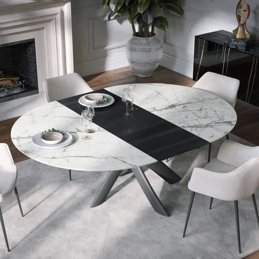 Exclusive Tonin Casa Style round table with ceramic top exhibiting white and grey veining and painted steel base