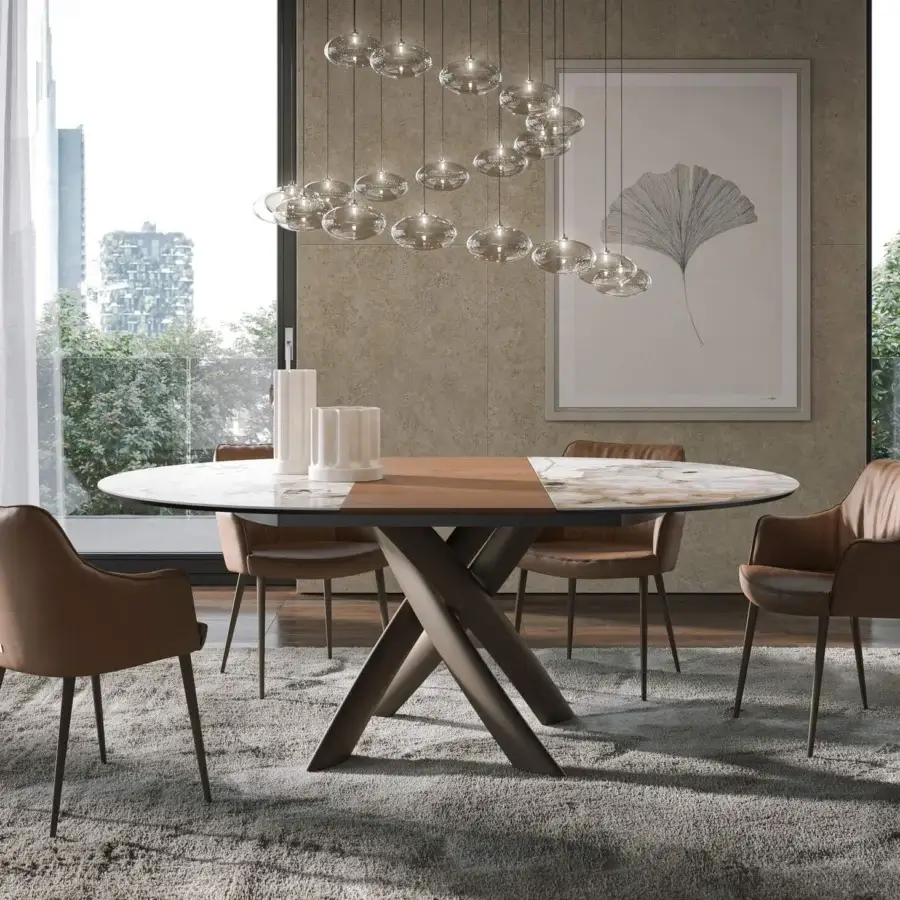 Distinguished Tonin Casa Style round table with ceramic, wood and painted steel built with a dynamic crisscross base and matte finish