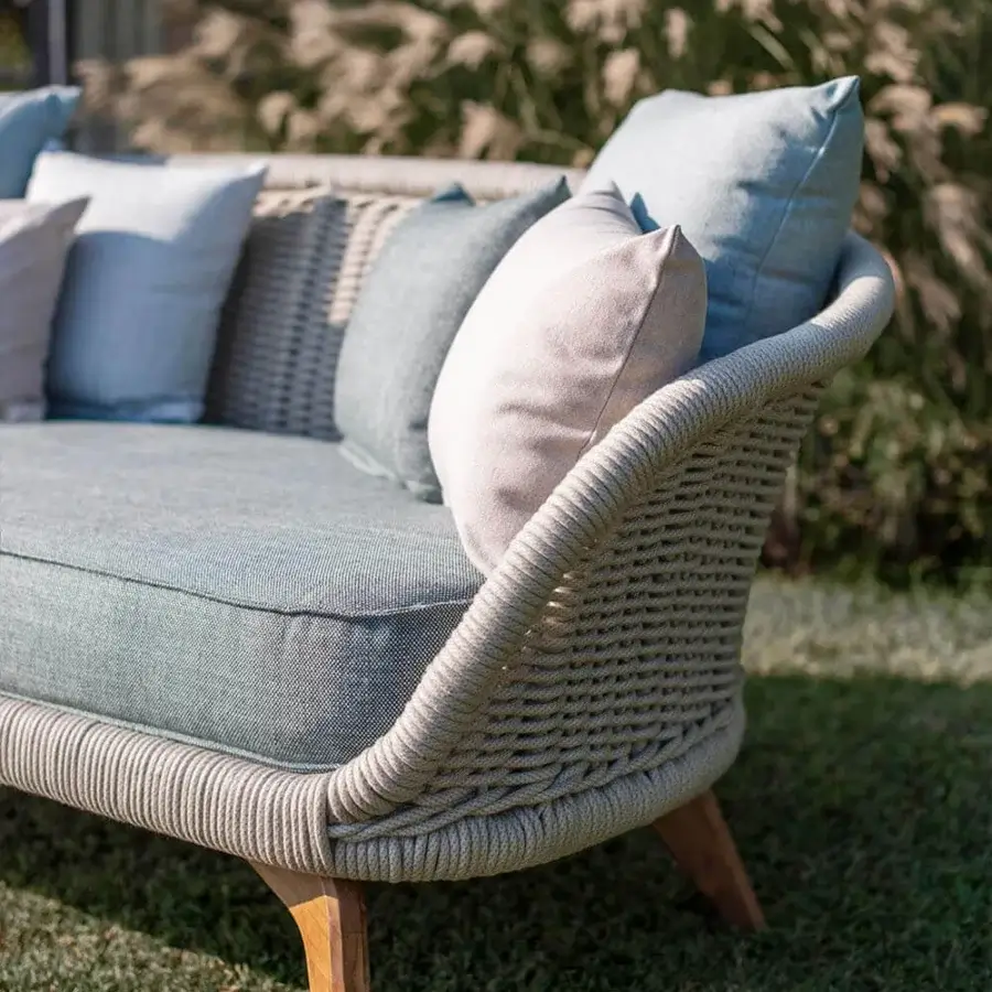 Superior Atmosphera Ludo sofa with distinctive organic shape and sculpted form crafted in teak wood with a light beige woven frame