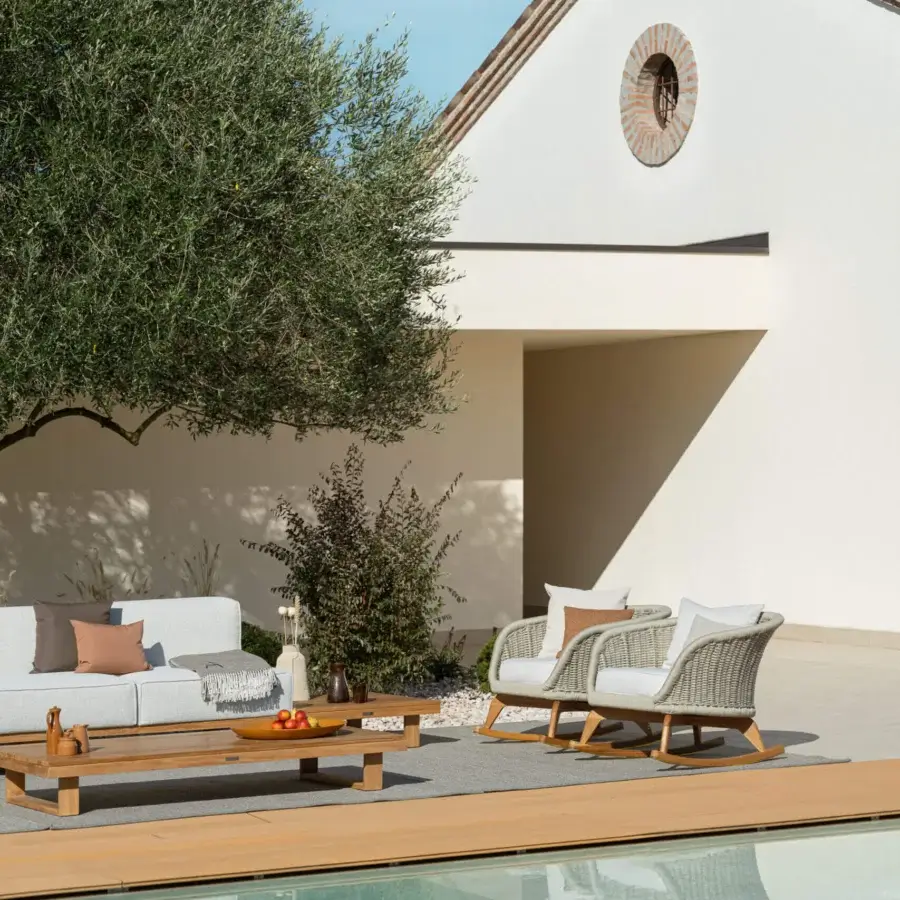 Sophisticated Atmosphera Ludo rocking lounge chair crafted with natural Teak and hand-woven light gray rope backrest