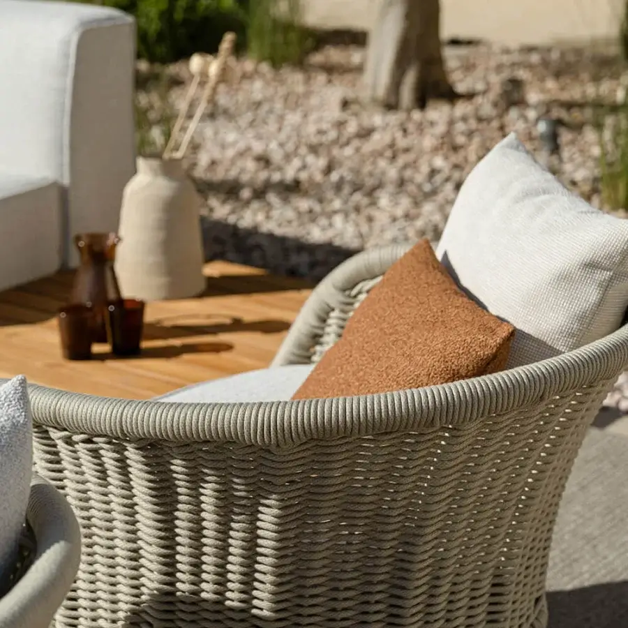 Distinguished Atmosphera Ludo rocking lounge chair with natural Teak base and hand-woven gray rope backrest crafted for refined outdoor comfort