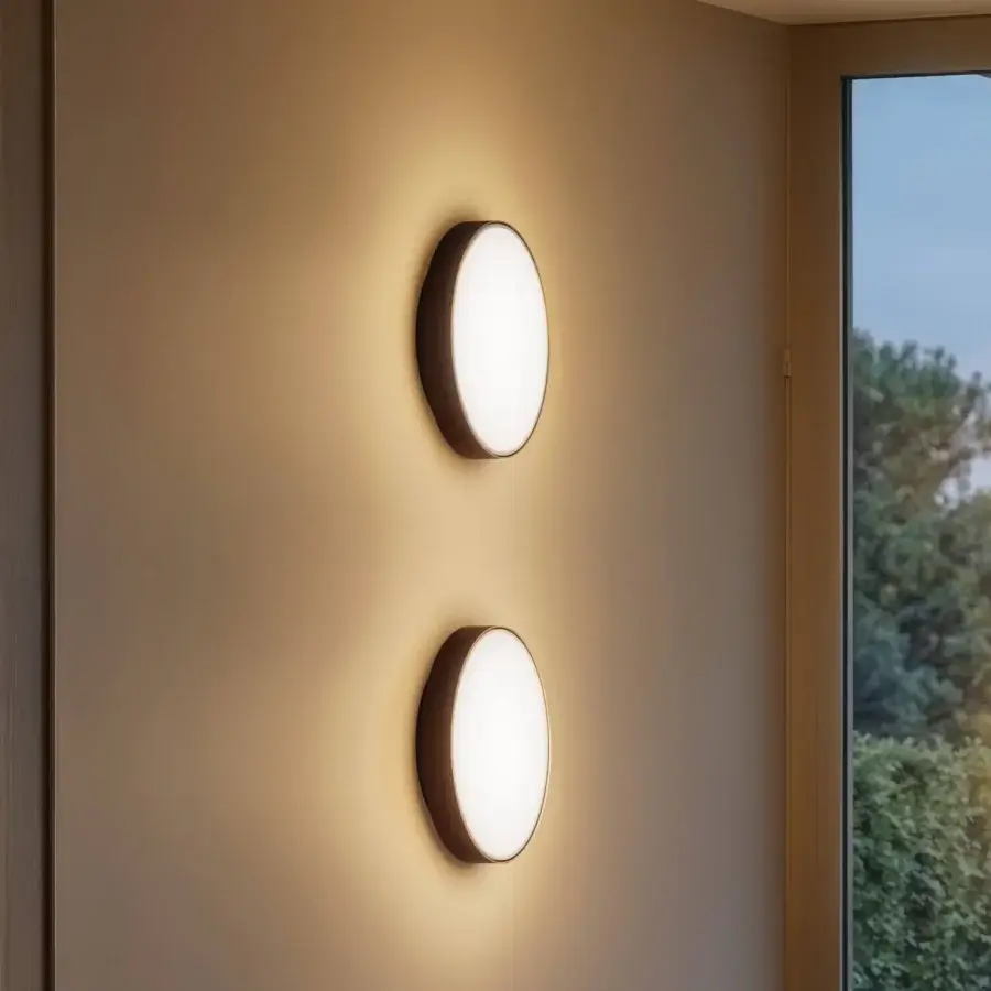 Exceptional Contardi Discus wall lamp crafted in metal with matte finish and white opaline diffuser