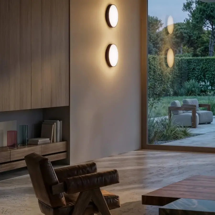 Elegant Contardi Discus wall lamp crafted in metal with satin finish and warm white glow sold as a set