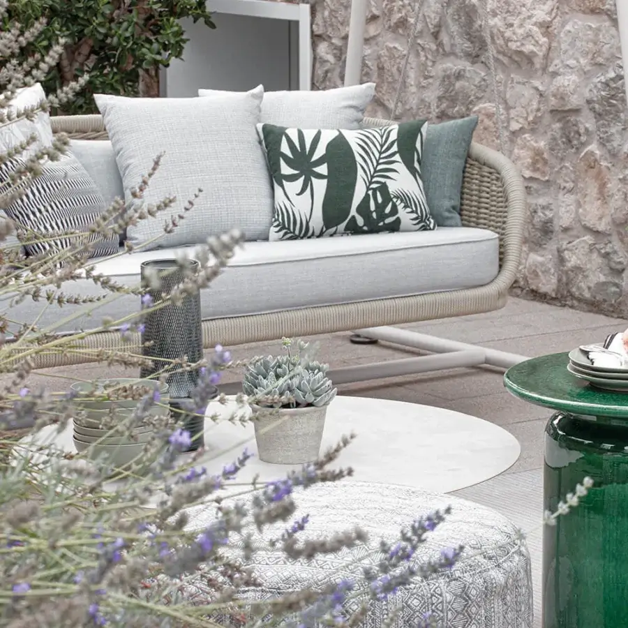 Exceptional Atmosphera Ludo freestanding swing with textured synthetic fiber weave and galvanized iron structure in white, gray, and verdant foliage patterns