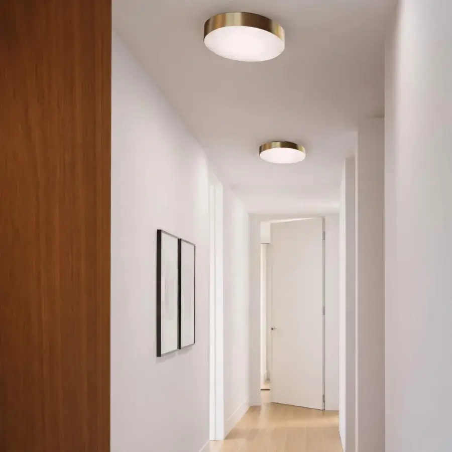Distinguished Contardi Discus ceiling lamp crafted in sculpted metal with satin gold finish and white opaline diffuser
