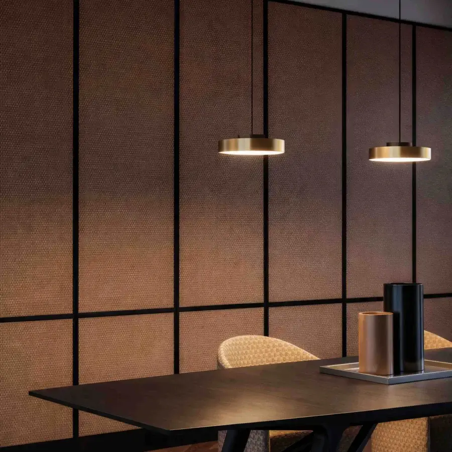 Distinguished Contardi Discus suspension lamp crafted in sculpted metal with a warm gold satin sheen, sold as a set of two