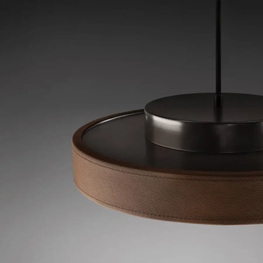 Superior Contardi Discus suspension lamp crafted in sculpted metal with a warm brown, leather-like material and matte finish