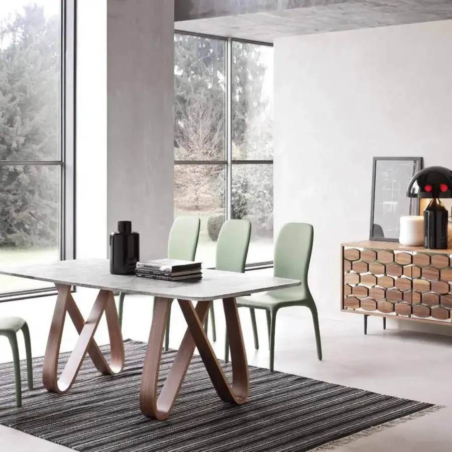 Exceptional Tonin Casa Butterfly table crafted in marble with a subtle mottled pattern and warm medium-brown wood with a satin finish