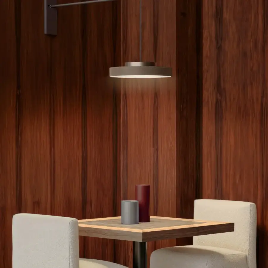 Superior Contardi Discus rotating wall lamp in muted gray metal with a sleek matte finish