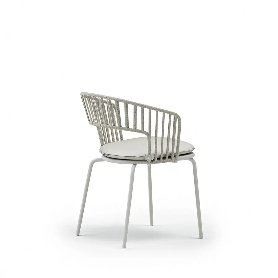 Exceptional Atmosphera Onda armchair with braided backrest and welcoming curves in light gray synthetic material with matte metal frame