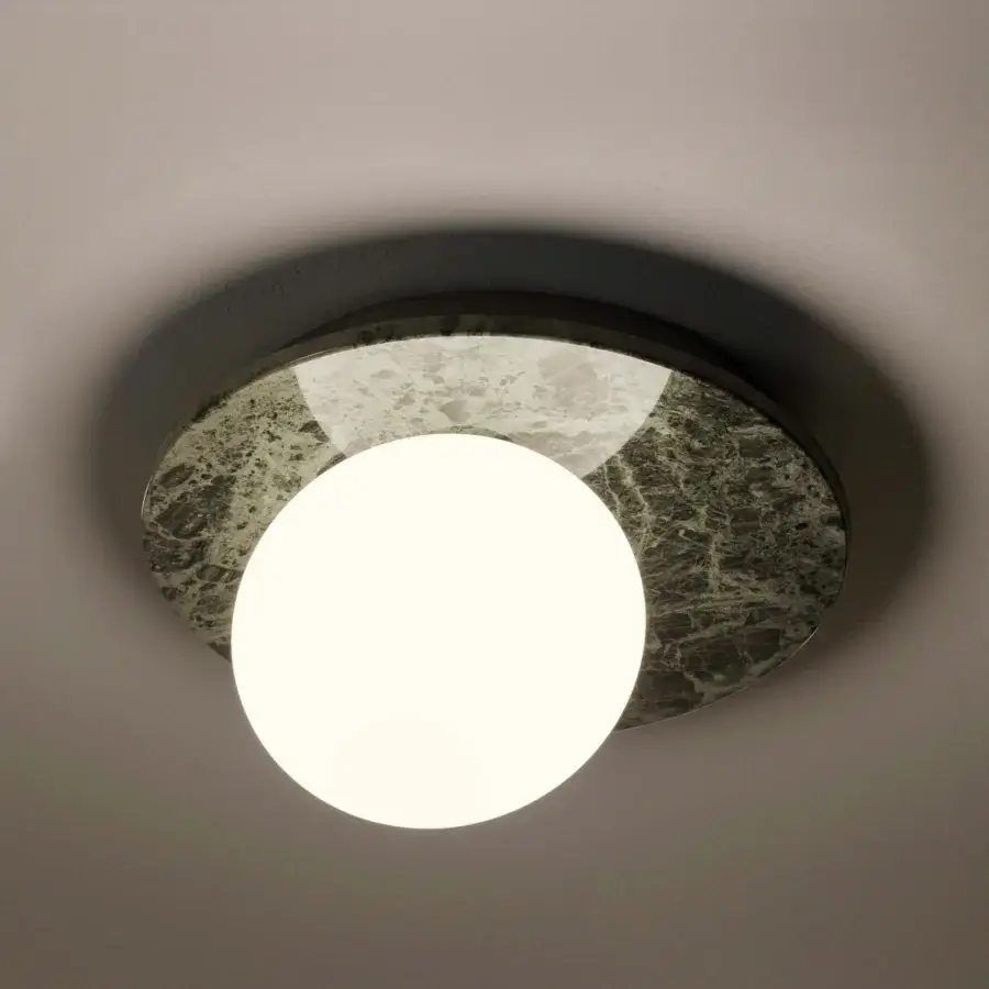 Elegant Contardi Emma ceiling lamp crafted in dark mottled marble with softly illuminated white opal glass