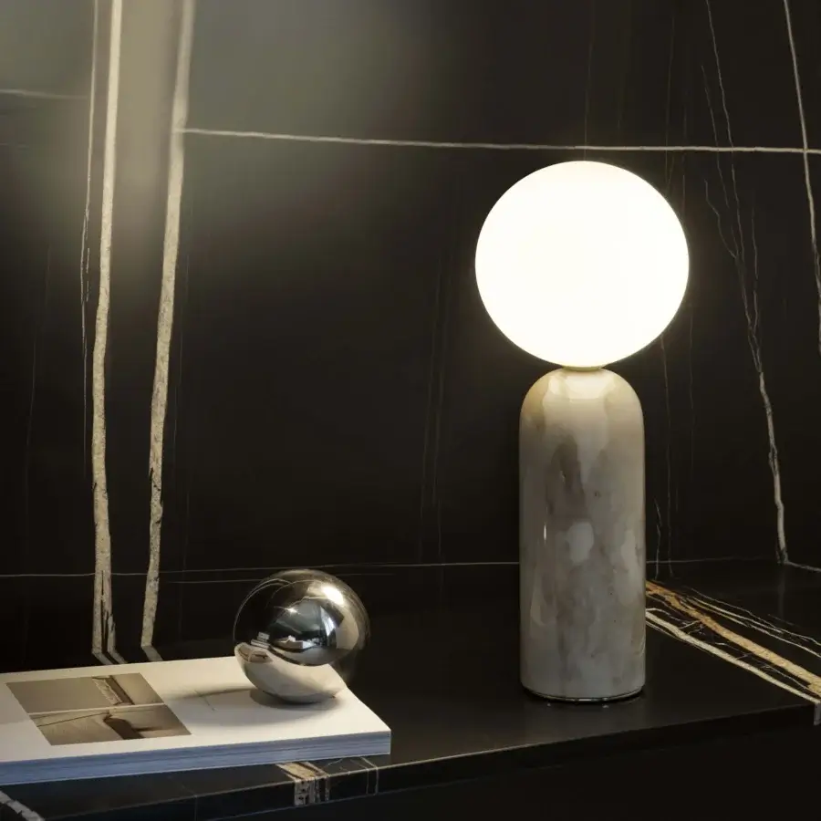 Distinguished Contardi Emma table lamp with precious marble base and white opal glass sphere diffuser in polished white and grey