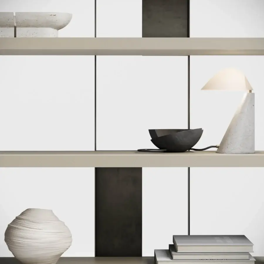 Architectural Capital Giselle bookcase crafted with wood and a sophisticated metal finish in a neutral beige-grey tone with reflective qualities