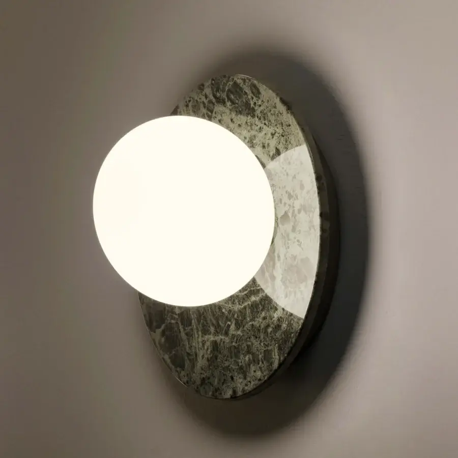 Exceptional Contardi Emma Wall Lamp crafted in precious marble with a white opal glass sphere diffuser for balanced illumination