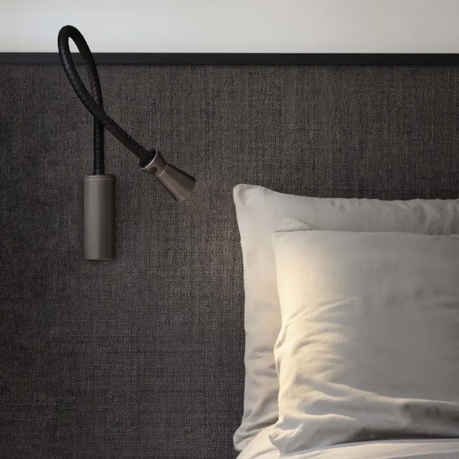 Elegant Contardi G+T wall lamp crafted in brass with a woven leather flexible arm and dark bronze matte finish