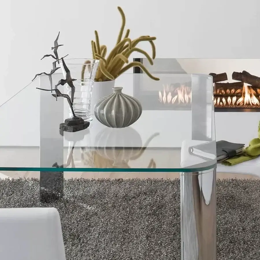 Distinguished Ivano Antonello Italia Scott dining table with a tempered glass top and polished aluminum leg arrangement in white lacquer