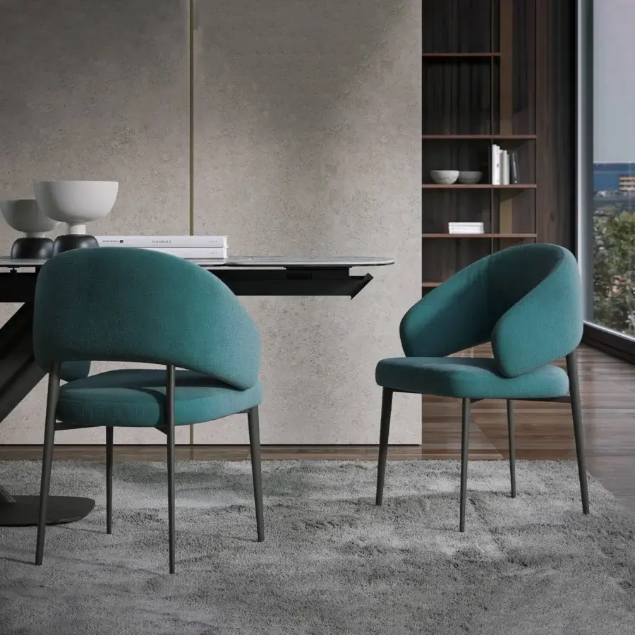 Exceptional Tonin Casa Astra armchair in teal blue-green textile with a dark finished metal base and plywood frame