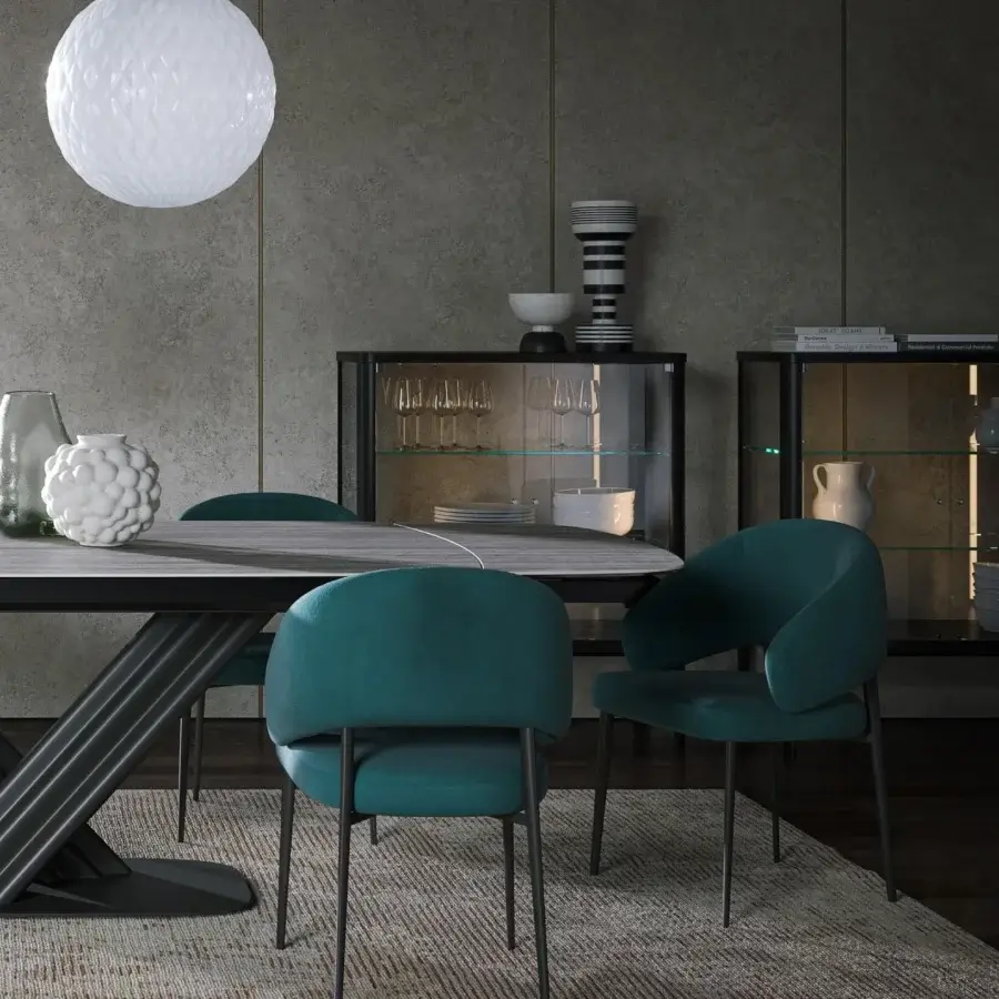Sophisticated Tonin Casa Astra armchair with curved silhouette and muted teal fabric upholstery built with a dark-toned metal base
