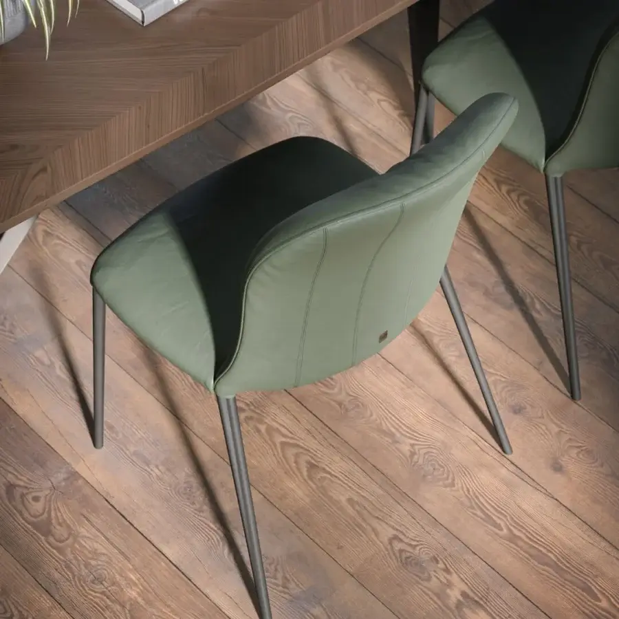 Distinguished Tonin Casa Bustier chair with olive green textile upholstery and satin lacquered metal structure