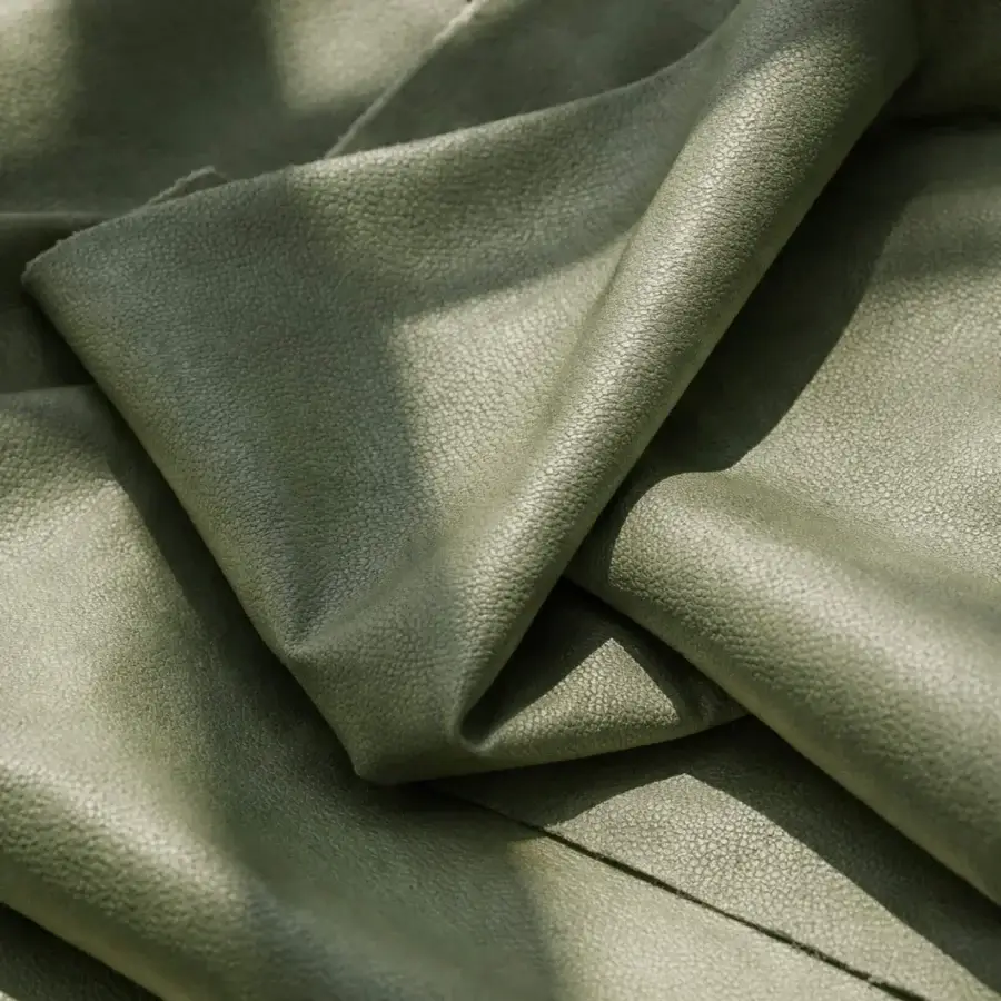Distinguished Tonin Casa Bustier chair with olive green matte finish and textured fabric upholstery