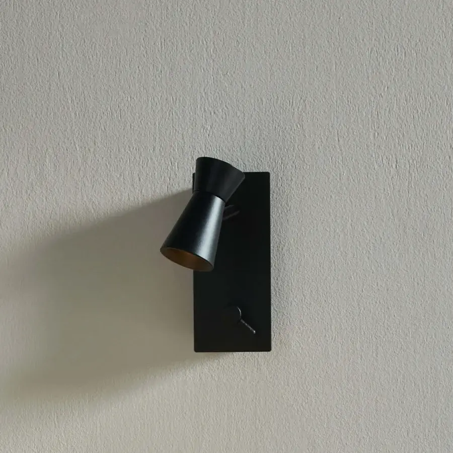 Elegant Contardi G+T Reading Wall Lamp crafted in matte black metal with subtle golden interior accents