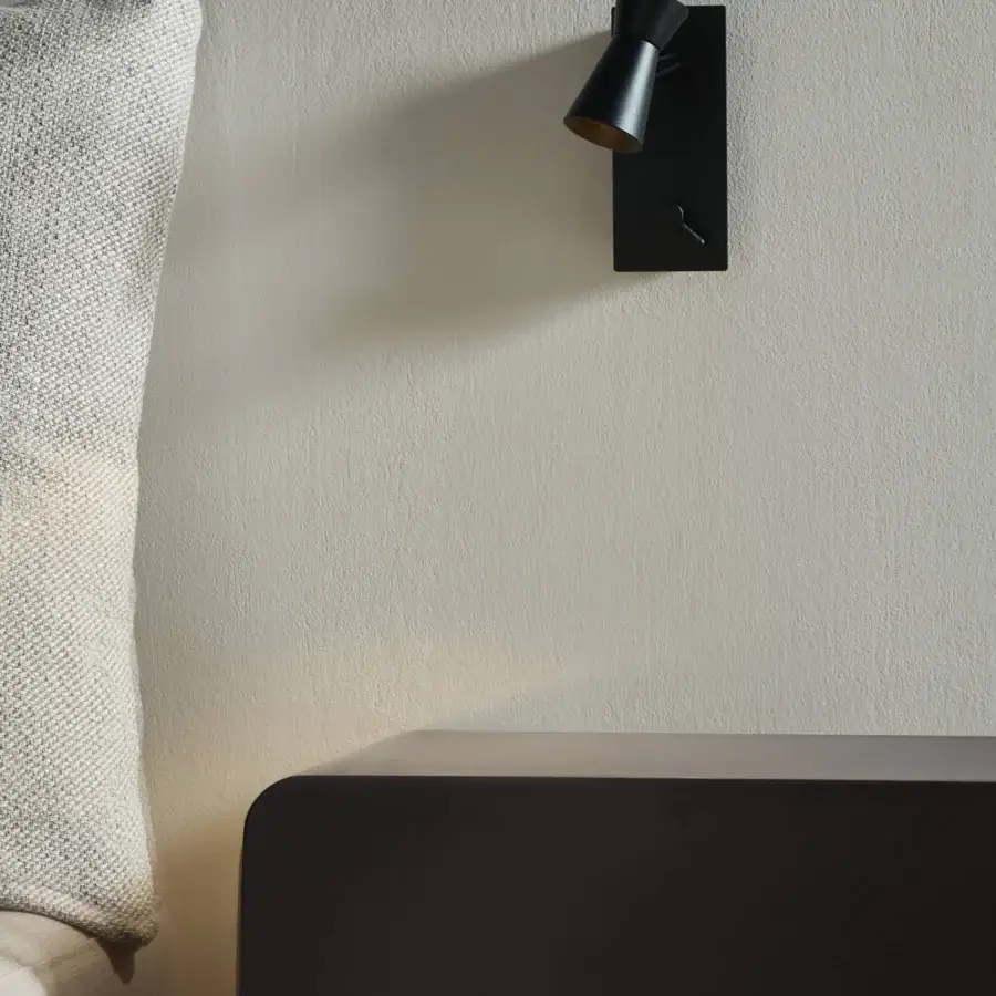 Distinguished Contardi G+T Reading Wall Lamp crafted in matte black metal with subtle gold accents and adjustable conical head