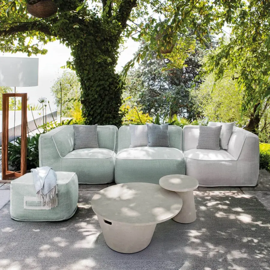 Exceptional Atmosphera Soft Modular Sofa with light green technical fabric and gray-white cushions creating a gently curved silhouette