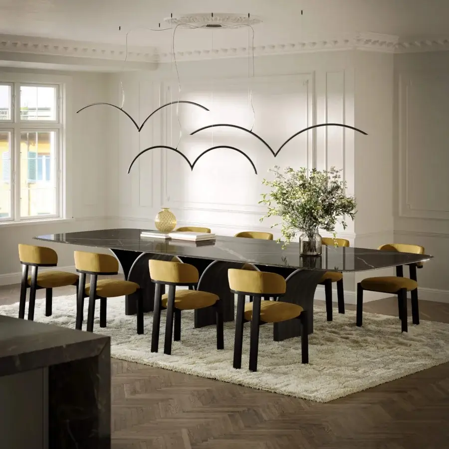 Distinguished Tonin Casa Camila chair with soft golden yellow velvety textile upholstery and matte black metal frame