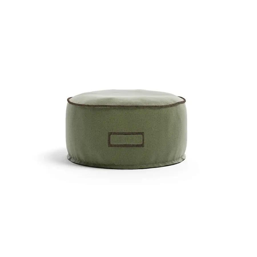 Distinguished Atmosphera Soft Round Ottoman with subtly textured muted olive green fabric and anti-slip rubberised base