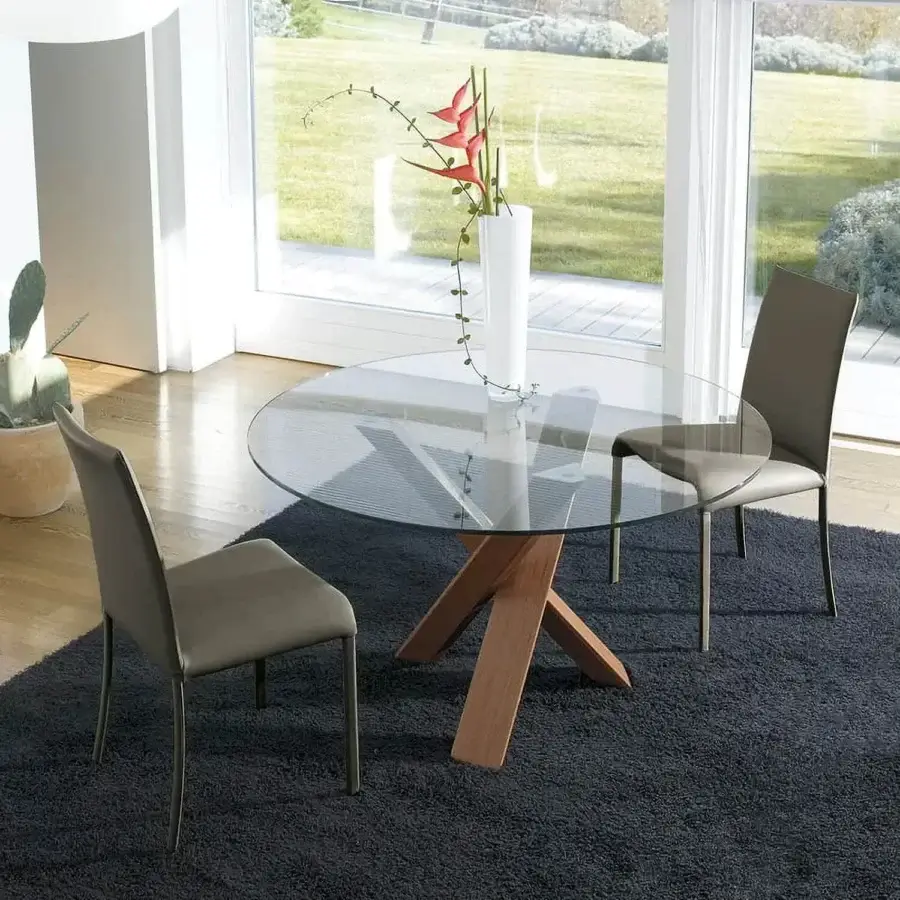 Captivating Ivano Antonello Italia Resort dining table with clear tempered glass and medium-toned wood grain base crafted in Italy
