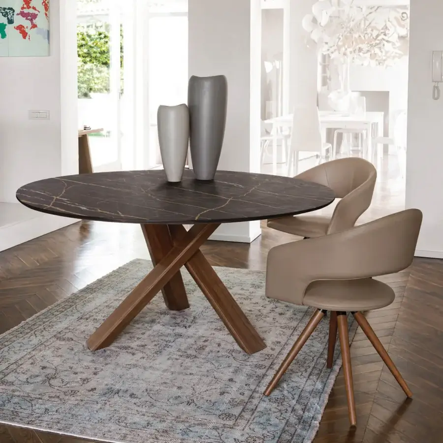 Elegant Ivano Antonello Italia Resort dining table with grey-veined surface and satin medium-brown wood base