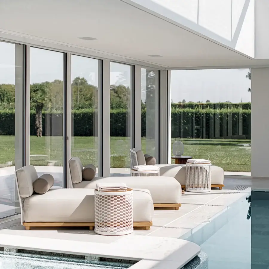 Sophisticated Atmosphera Switch chaise lounge with woven textile cushion and high-performance aluminum plate construction