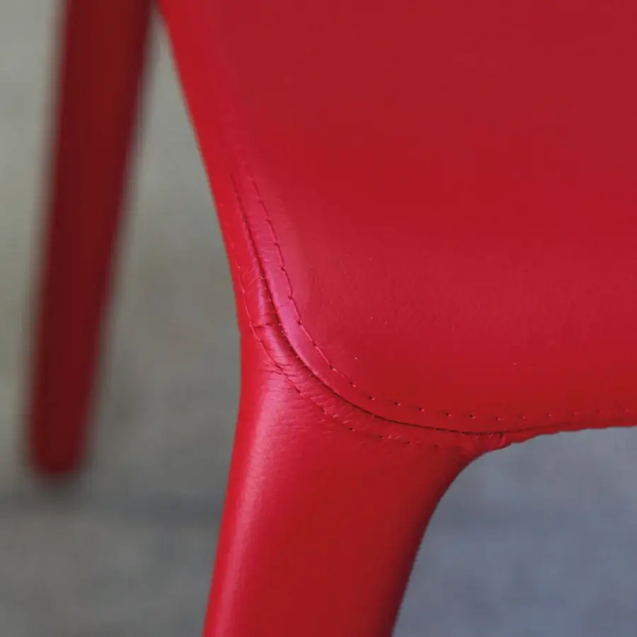 Exceptional Ivano Antonello Italia Malika dining chair with organic silhouette in vibrant red synthetic leather and steel frame