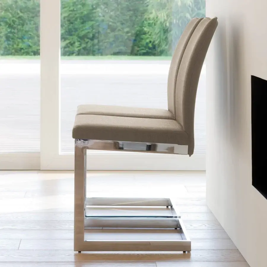 Architectural Ivano Antonello Italia Sonia dining chair with light tan textile upholstery and polished steel frame