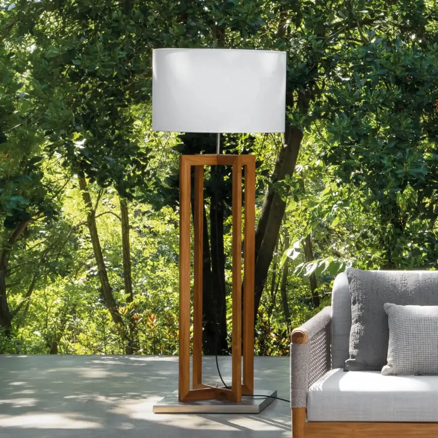Distinguished Atmosphera Vertigo floor lamp crafted in warm Teak with a satin finish and white textilene lampshade